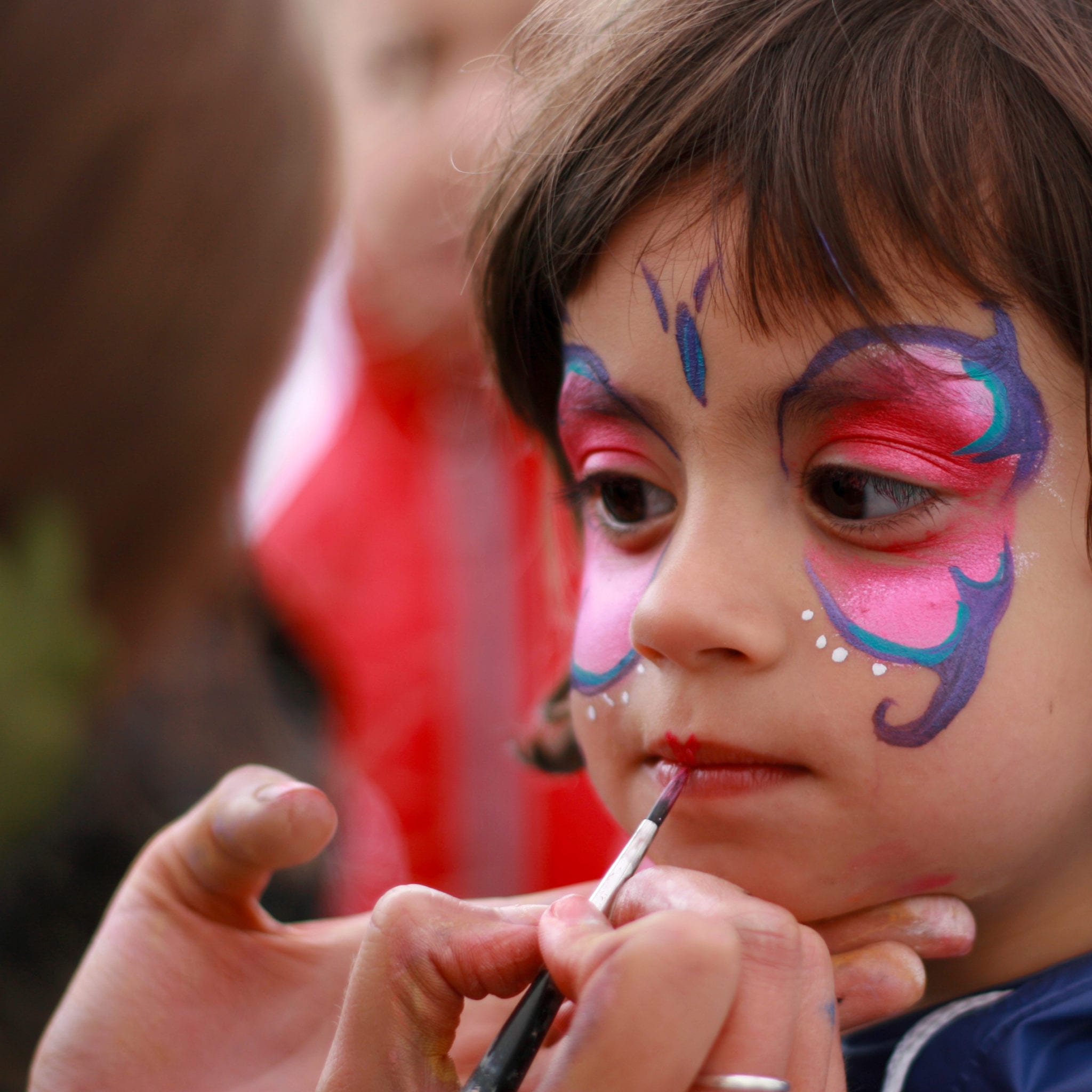 Little Girl Having Her Face Painted